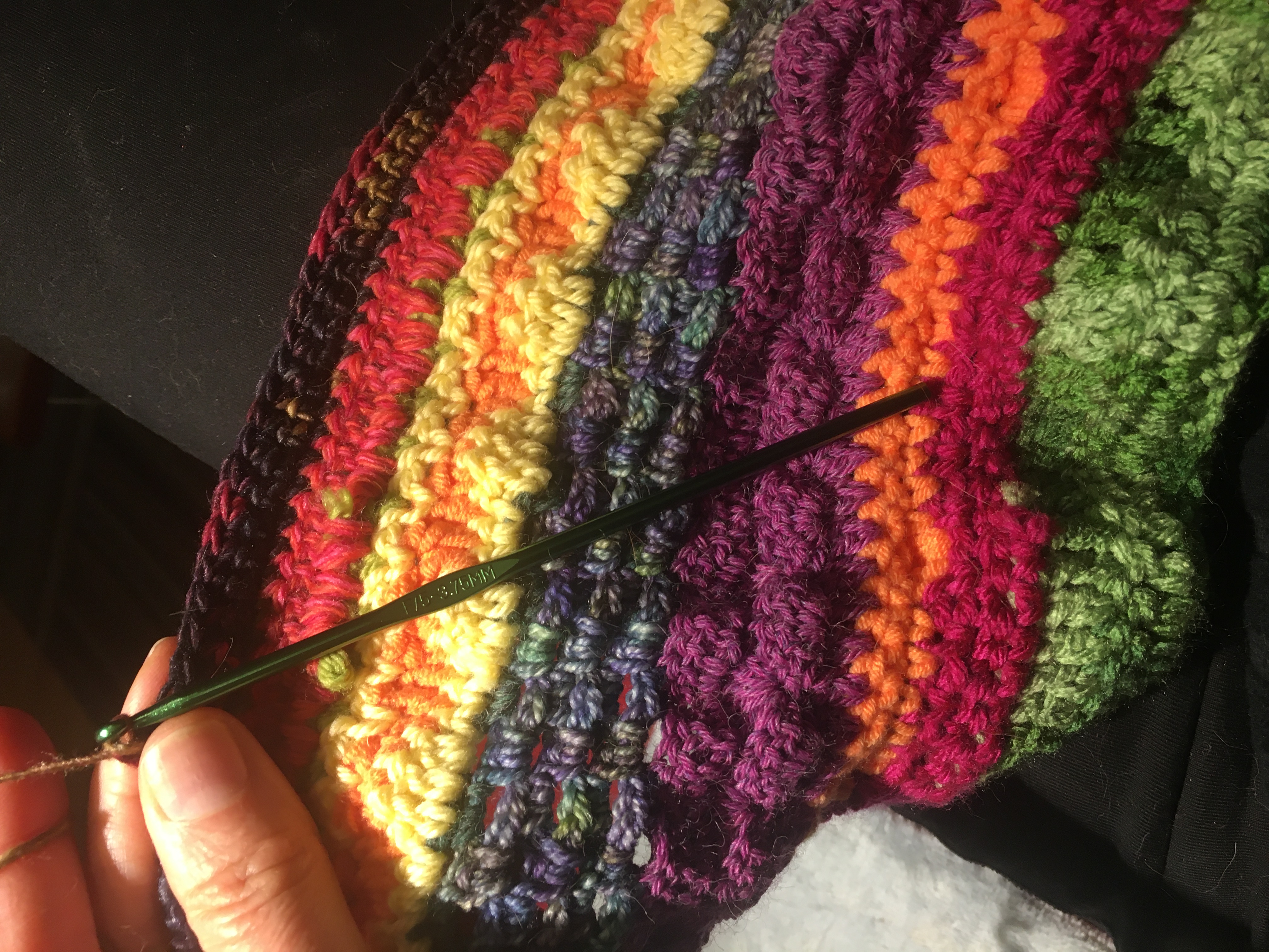 photo of rainbow crochet work